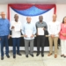 Fotografía del Director del INFOTEP y el ministro de Trabajo de Guyana, junto a otros funcionarios, muestran el acuerdo firmado. (Foto de PaginaUno.Do)